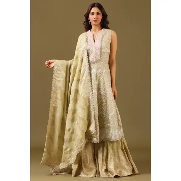 SEASONS-MUSTARD LIME GREEN SHARARA PANT SET AND A LONG KURTA TOP WITH ALL OVER PATTERNED EMBROIDERY PAIRED WITH A MATCHING DUPATTA AND CRYSTAL EMBELLISHMENTS.